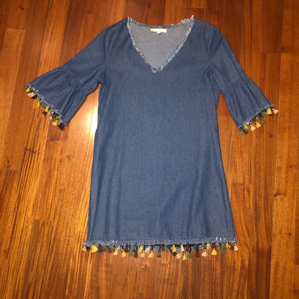Jean dress with colorful tassels.